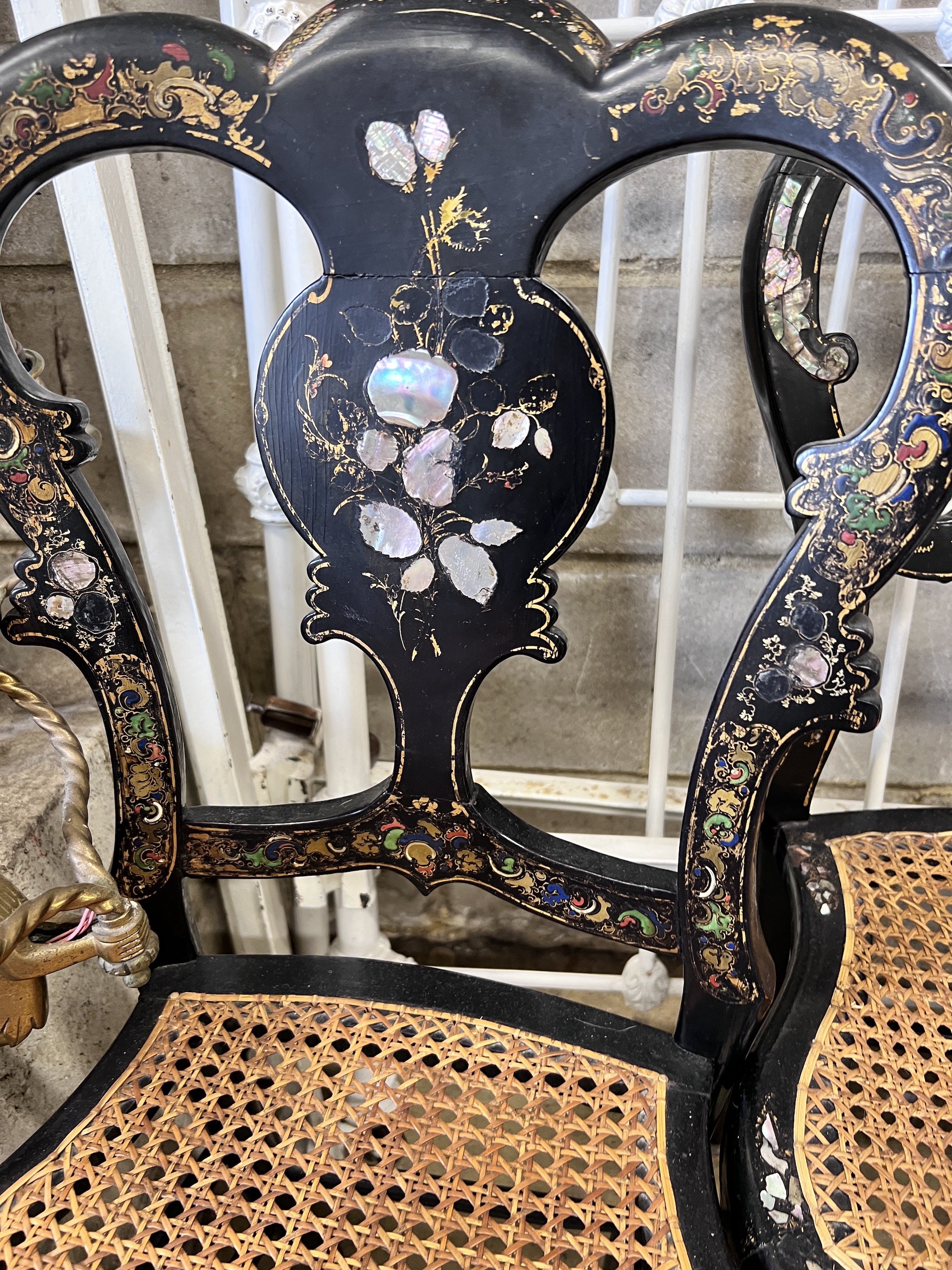 A pair of Victorian mother of pearl inlaid papier mache and ebonised salon chairs, height 85cm